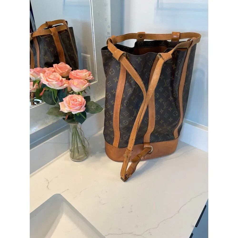 Louis Vuitton Authentic Randonnee PM Monogram Hobo Backpack Bag